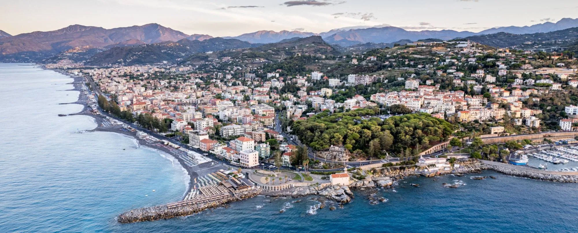 Aerial view of Bordighera with Capo Sant’Ampelio, the seafront and the harbour